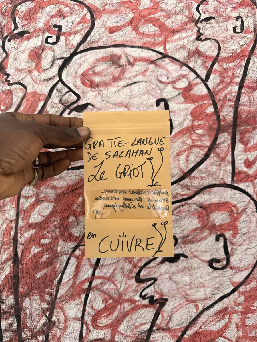 Gratte-langue en cuivre — Salaman Le Griot Jnani