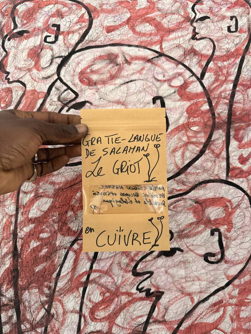 Gratte-langue en cuivre — Salaman Le Griot Jnani